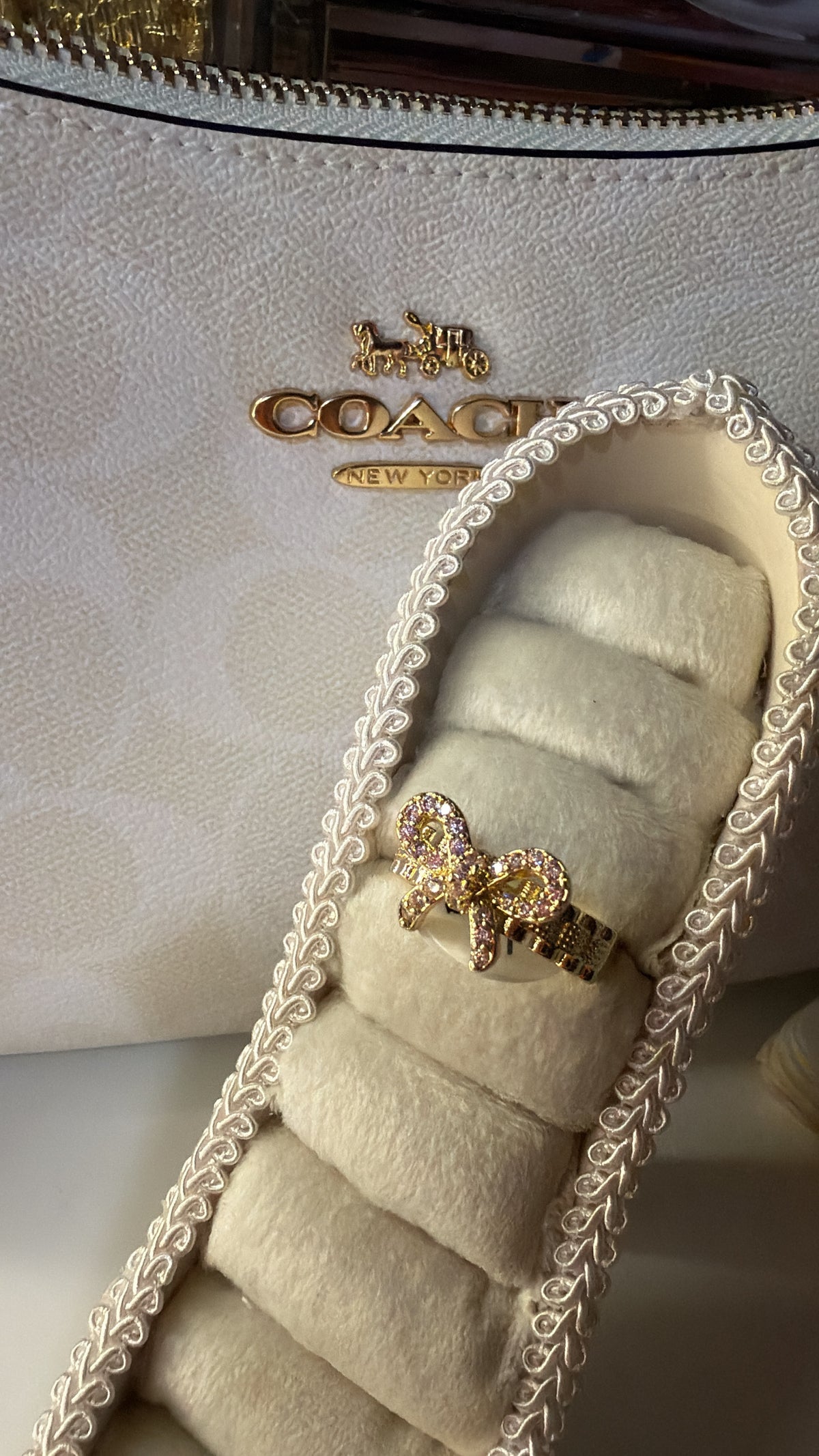 Pink chain bow ring