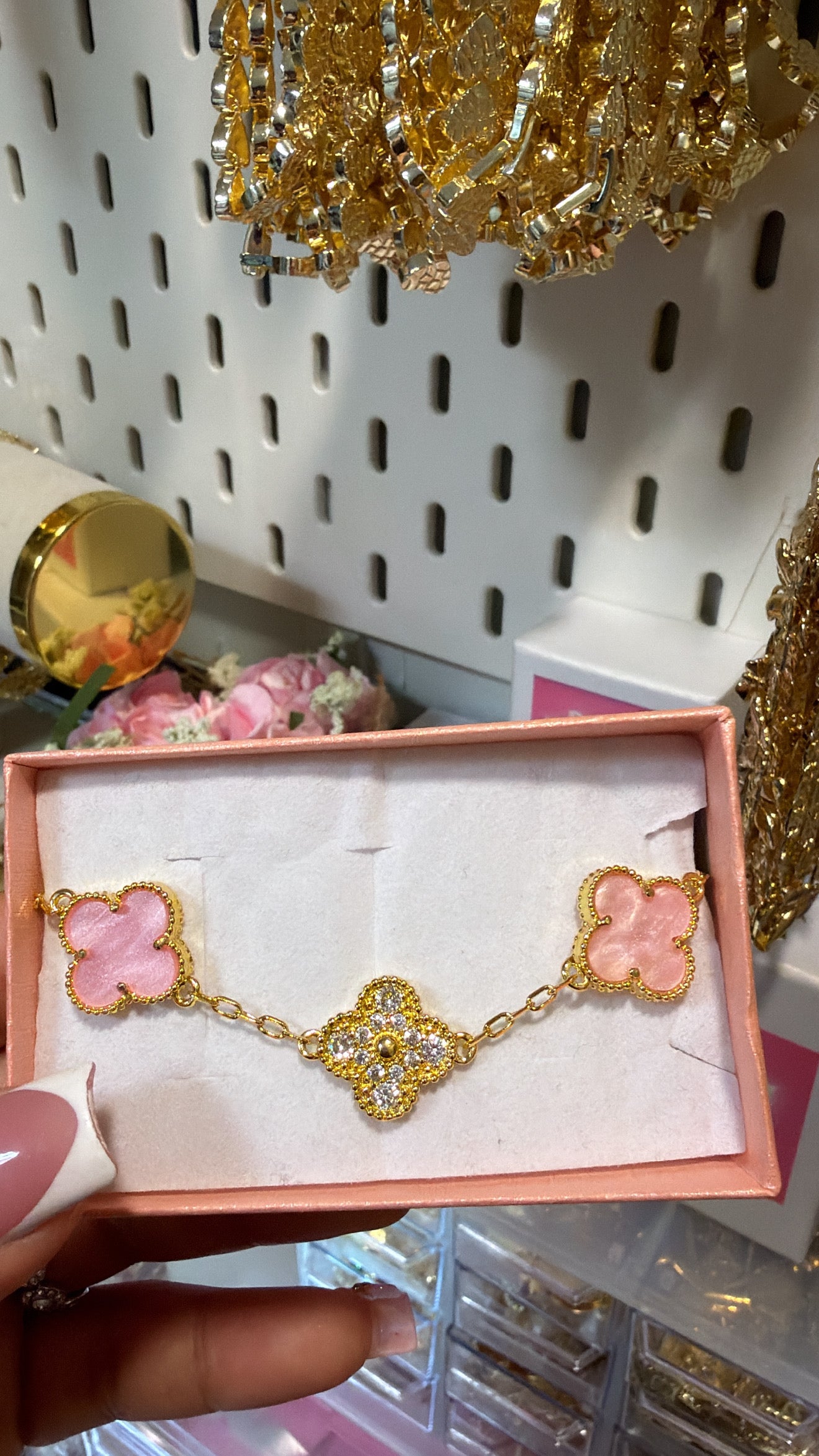 pink suerte bracelet.