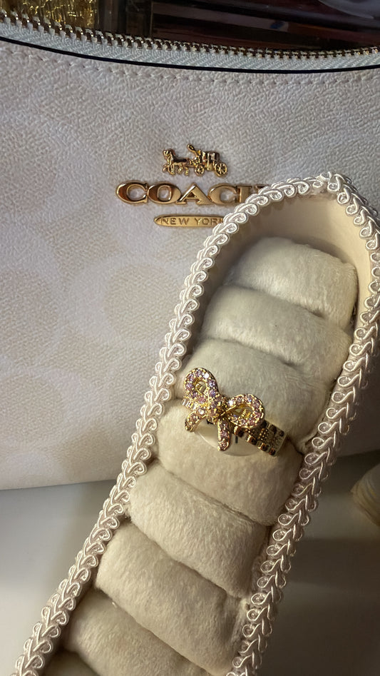 Pink chain bow ring