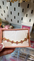 pink sparkly flower bracelet