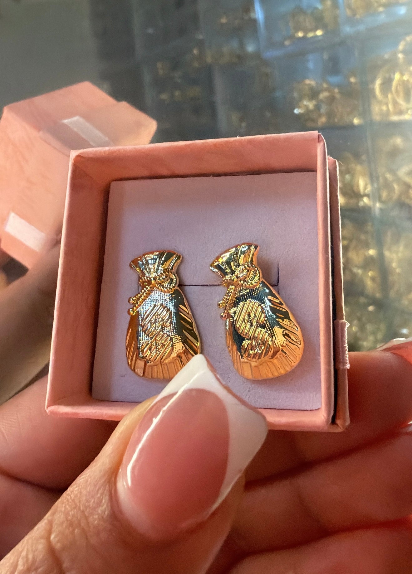 Money bag earrings